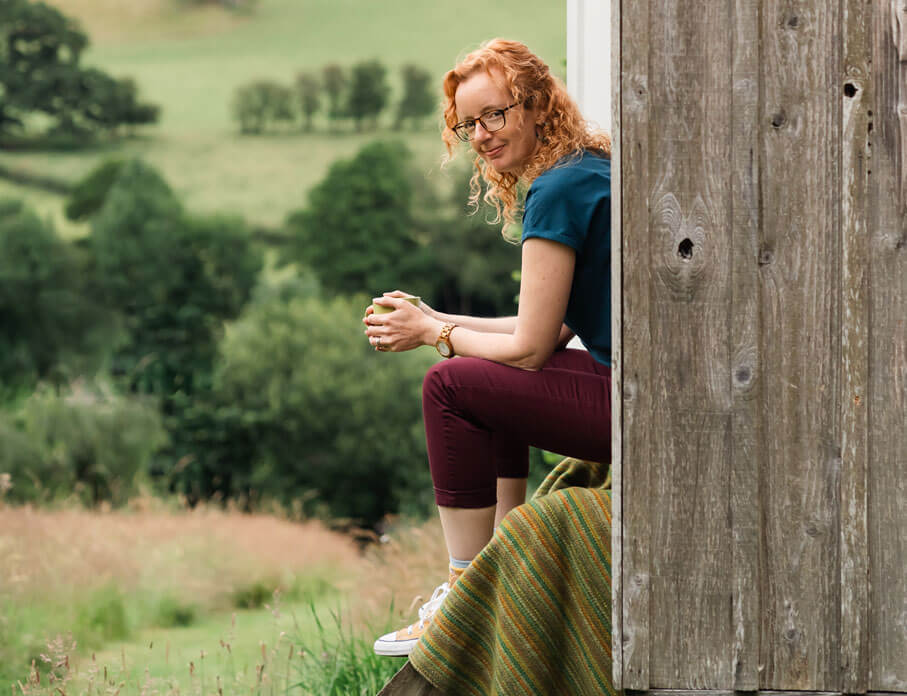 gabrielle treanor sat on some steps with a mug of tea gabrielle treanor sat on some steps with a mug of tea